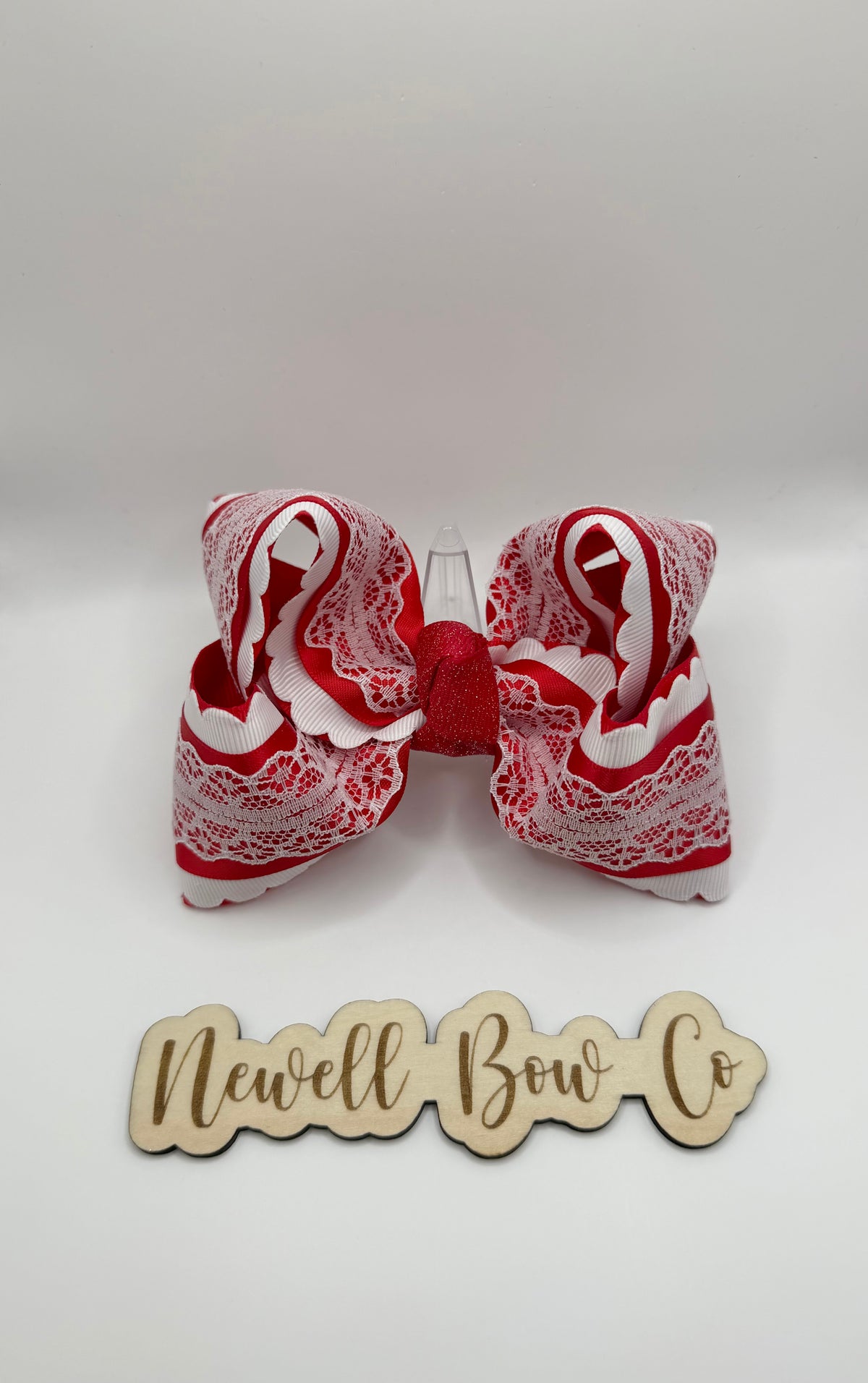 Red and white lace bow